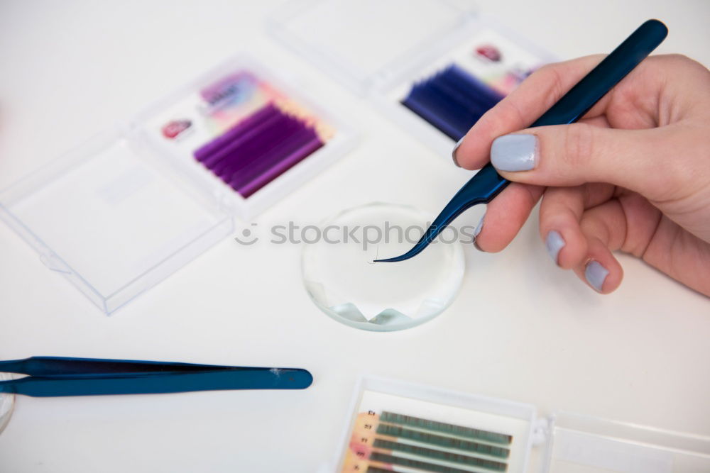 Similar – Close up on woman’s hands sewing needle and thread. Old woman working wasted hands .Tailor sewing some fabric. Details, low light, moody