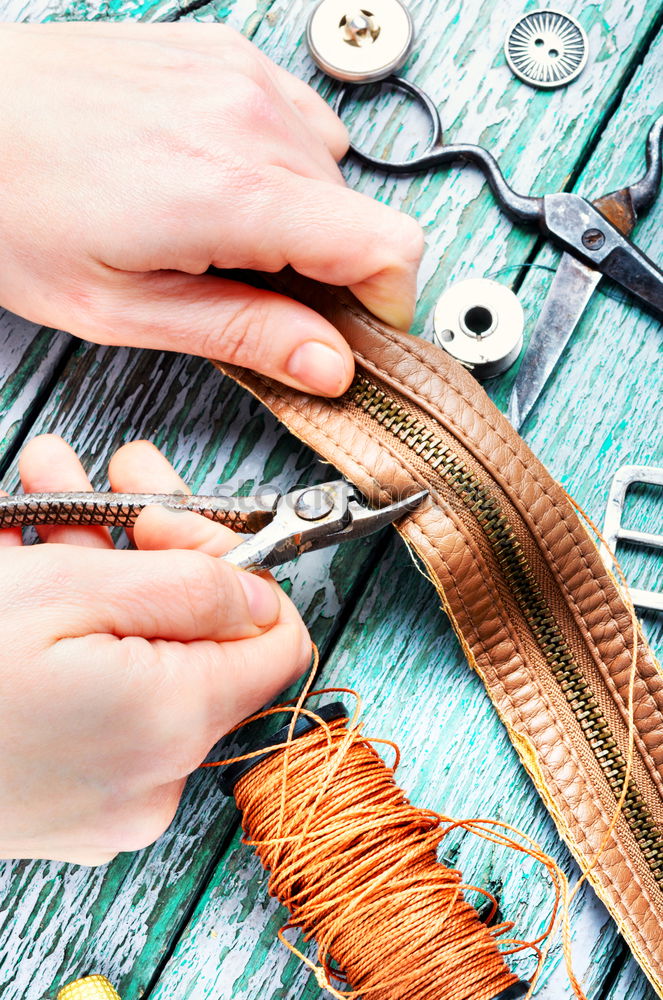 Similar – Tools of a tanner for working with leather