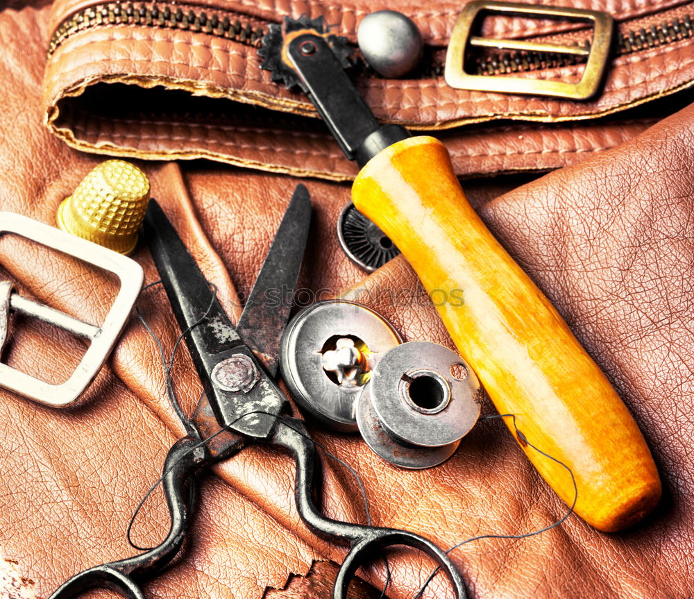 Similar – Tools of a tanner for working with leather