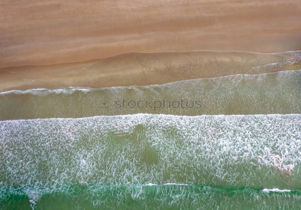 Similar – Image, Stock Photo Beautiful aerial view of a beach with waves