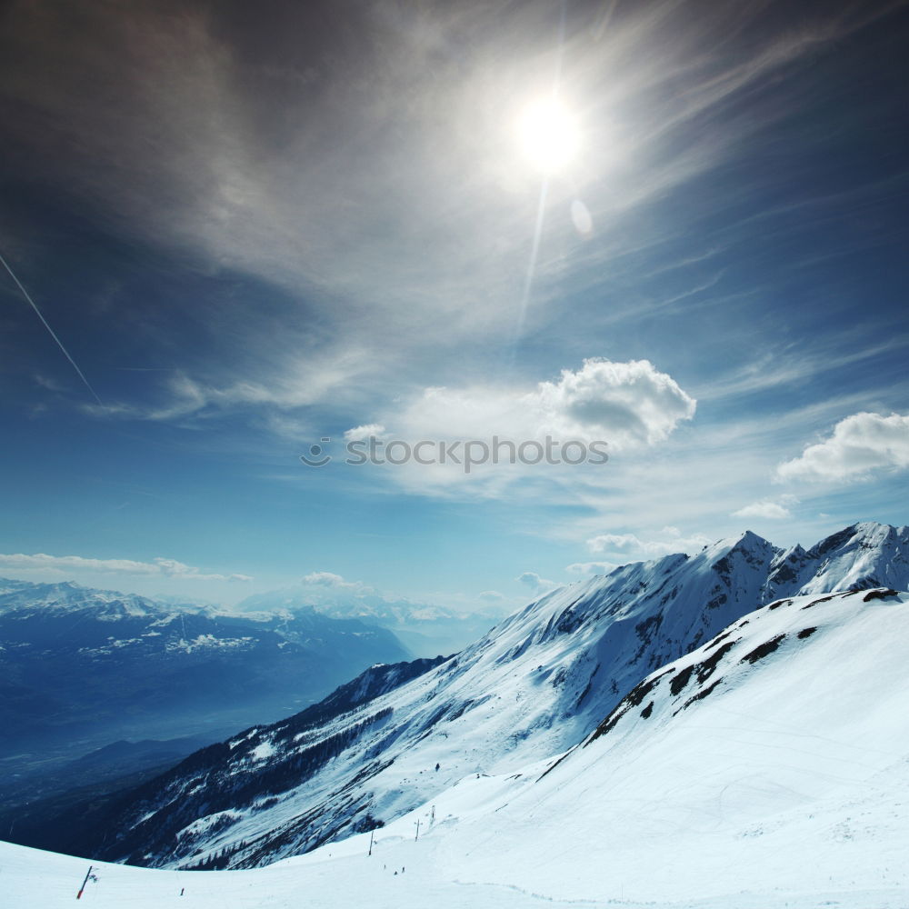 Similar – Image, Stock Photo Snowy blue mountains in clouds at sunset