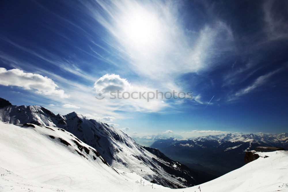 Similar – Image, Stock Photo Snowy blue mountains in clouds at sunset