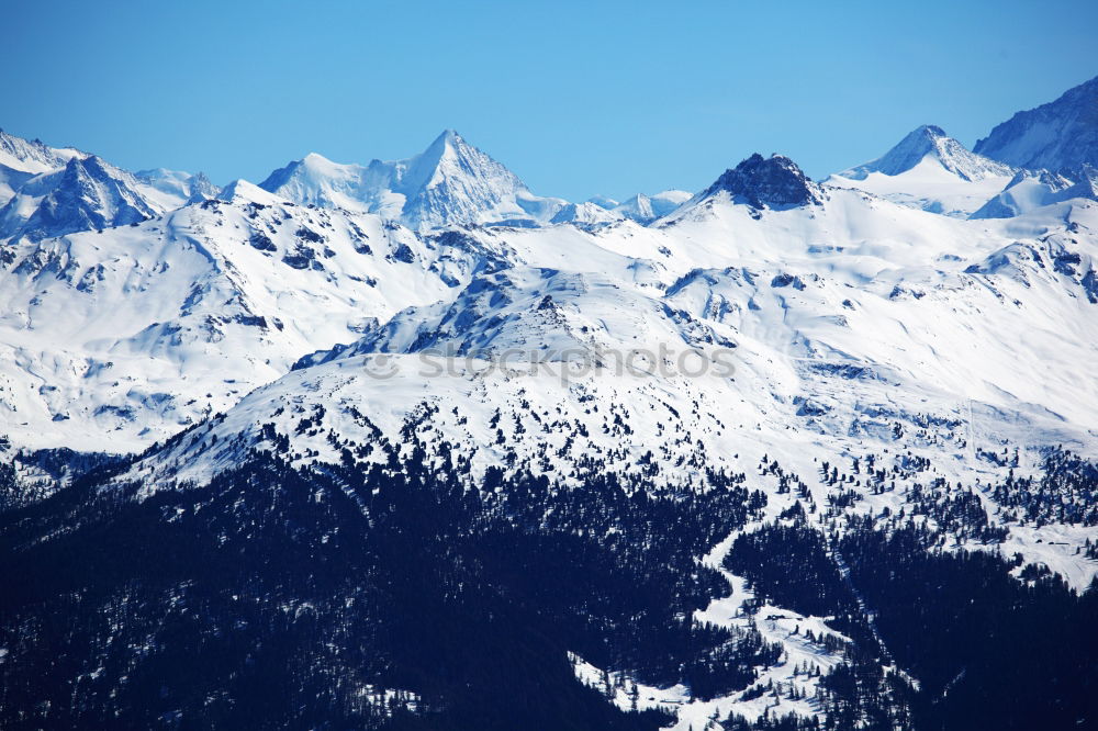 Similar – Sunset over the winter mountains