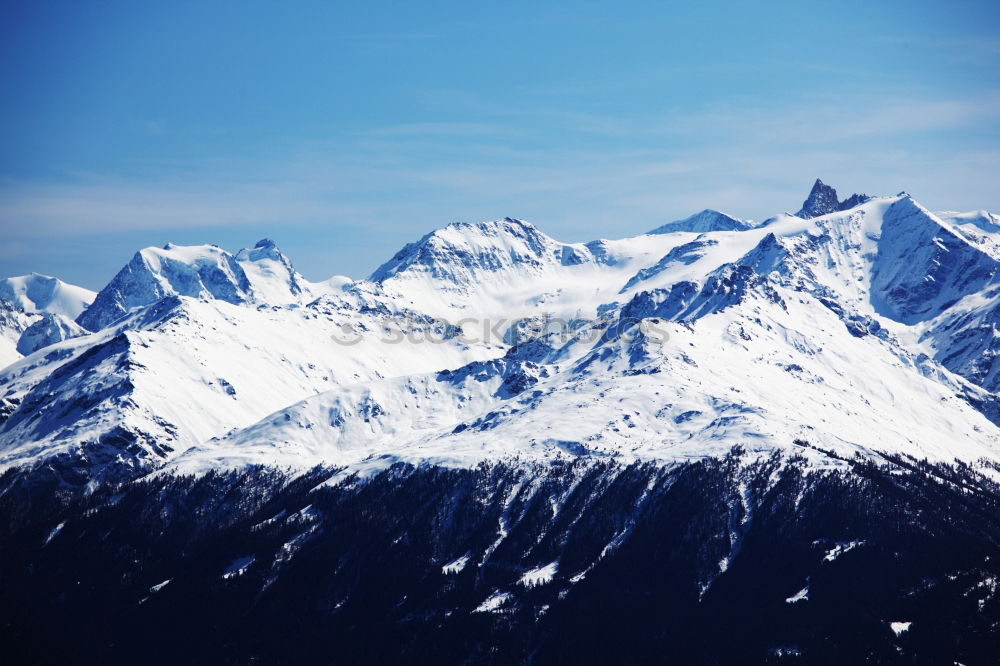 Similar – Image, Stock Photo Snowy blue mountain peaks in clouds