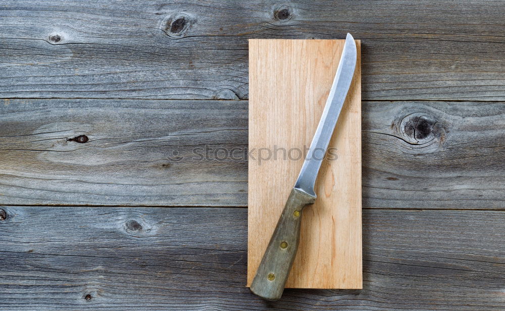 Similar – old brown wooden cutting board