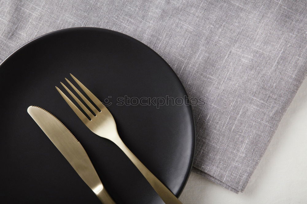 Similar – Image, Stock Photo Wooden spoon and fork on gray napkin