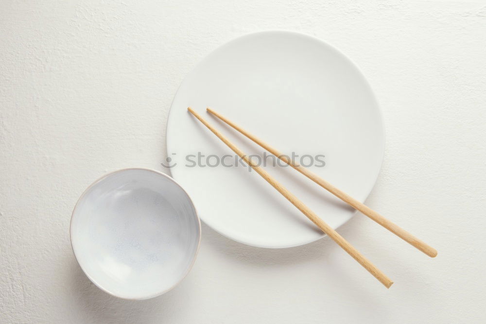 Similar – Image, Stock Photo Bowl with sticks on blue wood in bird’s eye view