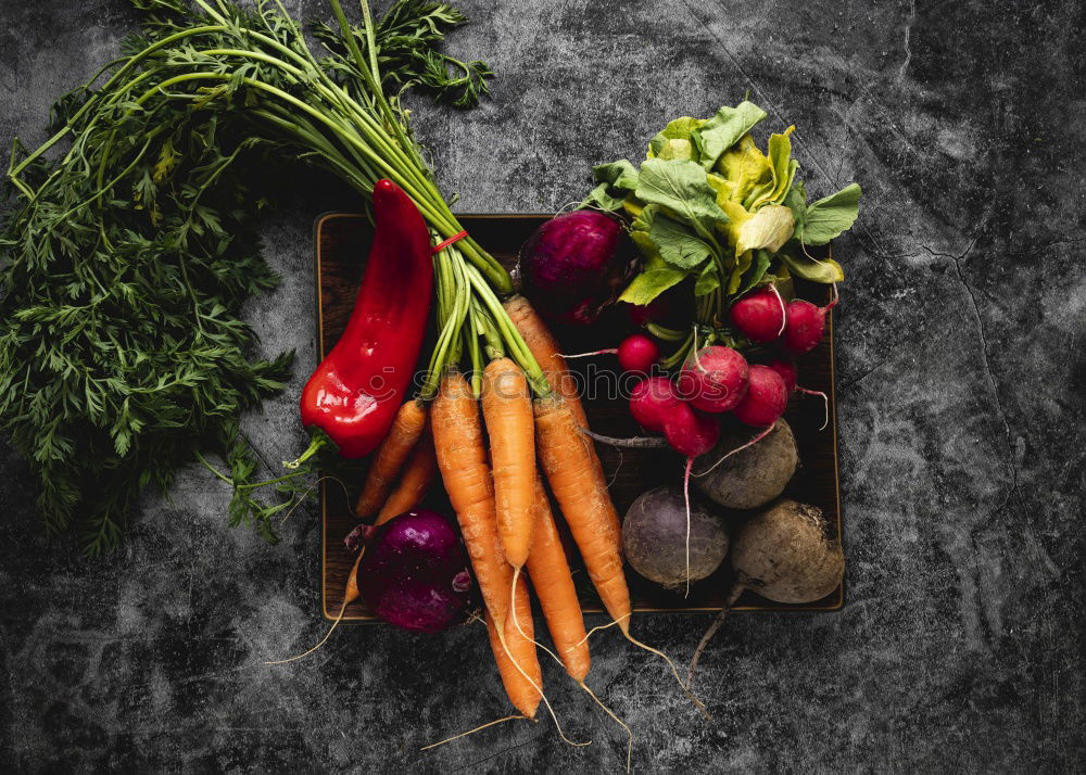 Similar – Sliced carrots on a chopping board