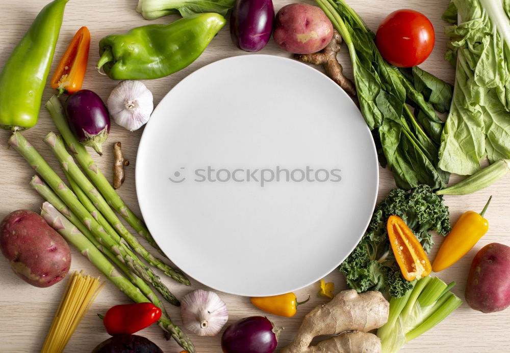 Similar – Fresh vegetables around a white table