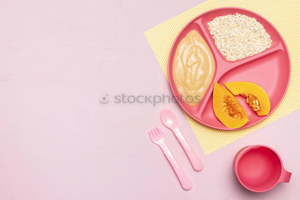 Similar – Disposable colorful plastic dish, straws and cups, cutlery. Flat lay on pink background.