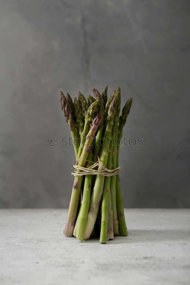 Similar – Image, Stock Photo Fresh raw asparagus spears on a white table