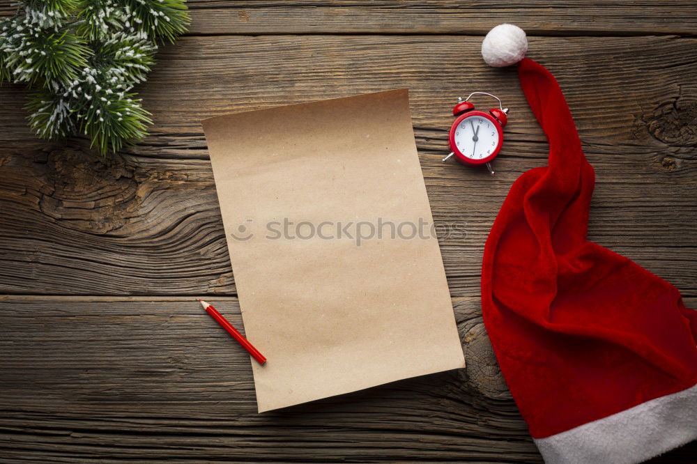 Similar – Foto Bild Papiertüte mit hölzernem Tannenbaum-Anhänger vor dunklem Hintergrund