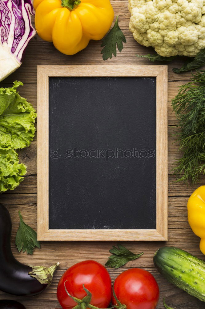 Similar – Vegetables and utensils on kitchen table