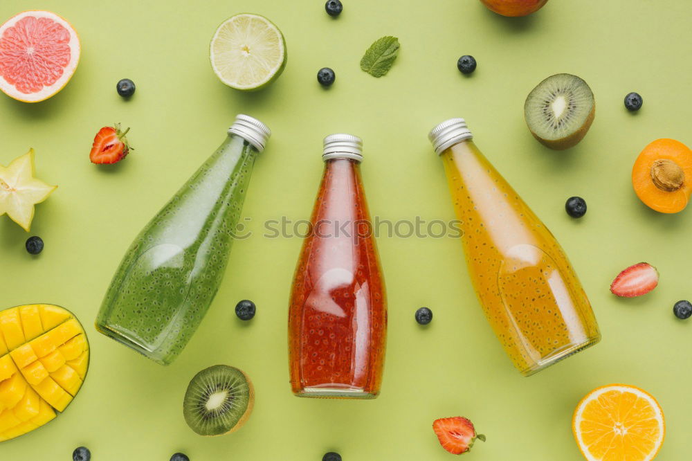 Similar – Image, Stock Photo Flacshe with yellow summer drink , fruit and fruit