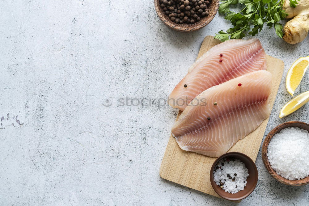 Similar – Image, Stock Photo Salmon fillet on cutting board with knife