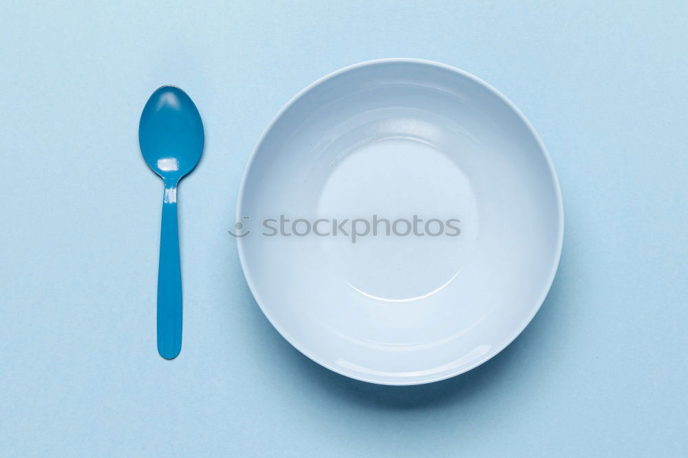 Similar – Empty plate on blue wood background