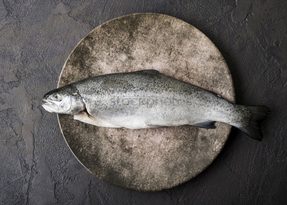 Similar – Frozen fish smelt on the kitchen board