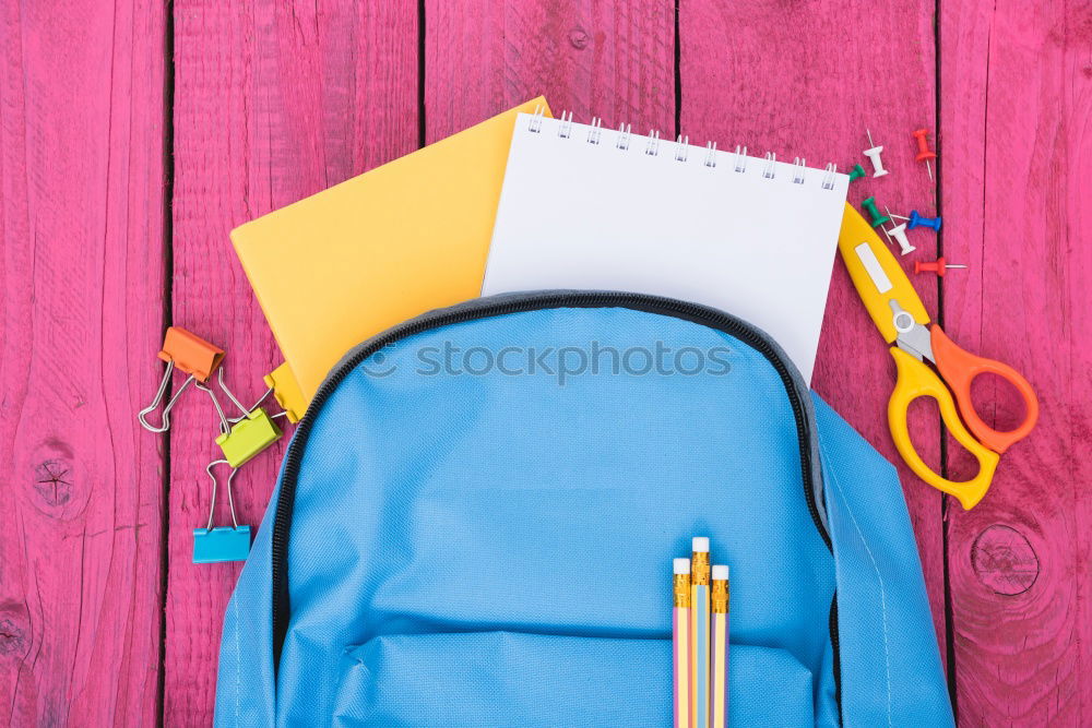 Similar – Image, Stock Photo Backpack and school supplies: books, magnifying glass, notepad