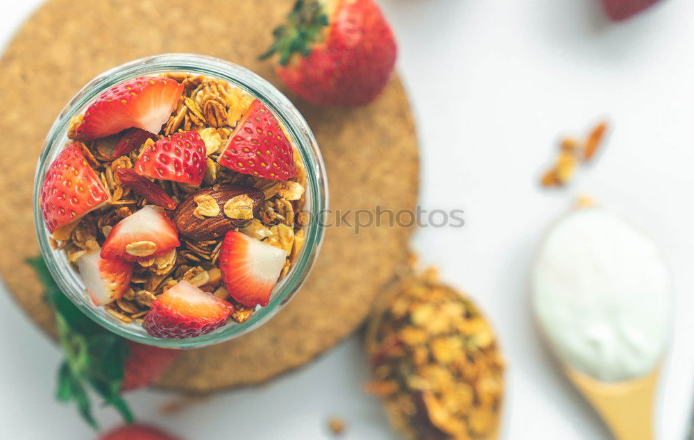 Image, Stock Photo Smoothie mango bowl with chia seeds yogurt pudding and cranberries, nuts, oatmeal topping in coconut shells with spoon. Healthy clean breakfast food. Copy space for your text or design