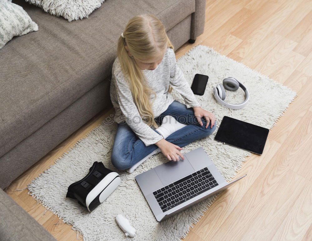 Similar – Image, Stock Photo Woman using a computer on the floor