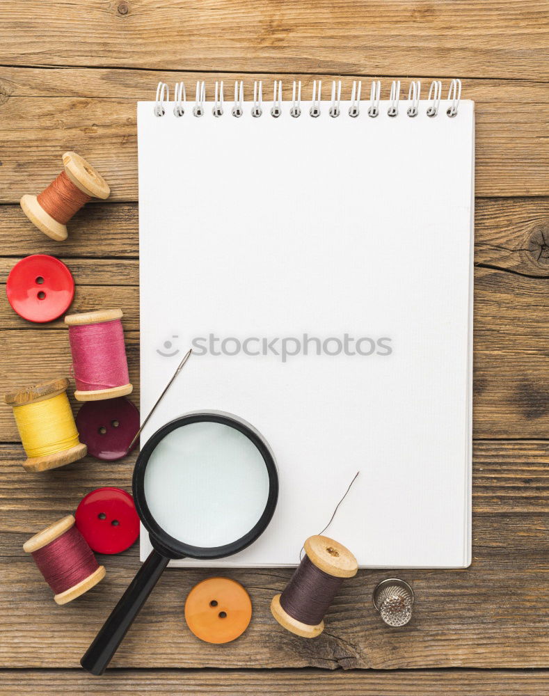 Similar – Garden tools with flower parts on empty notebook .