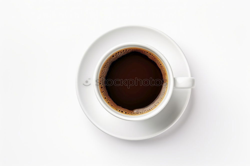 Similar – Image, Stock Photo Overhead view of a cup of black espresso coffee and a freshly baked croissant for breakfast. High angle close up