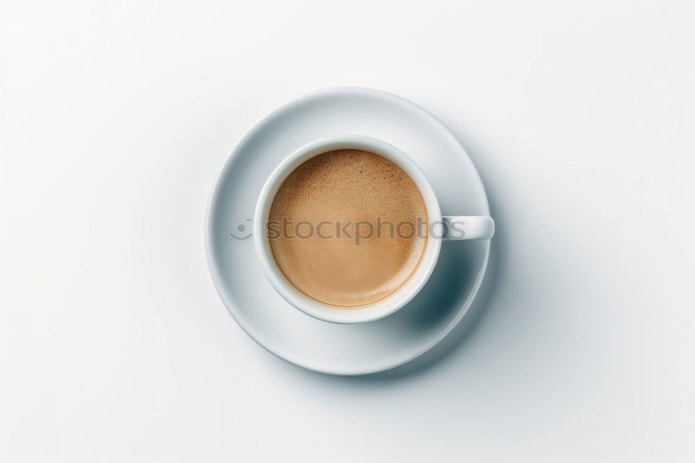 Similar – Image, Stock Photo Overhead view of a cup of black espresso coffee and a freshly baked croissant for breakfast. High angle close up