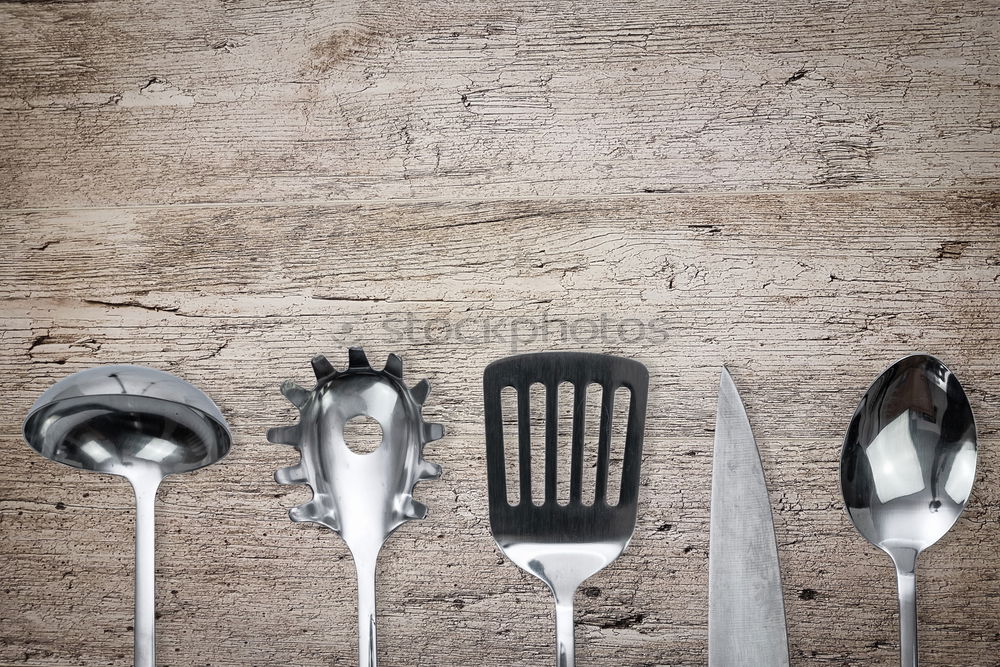 Similar – Image, Stock Photo Empty black cast-iron frying pan with vintage kitchen items