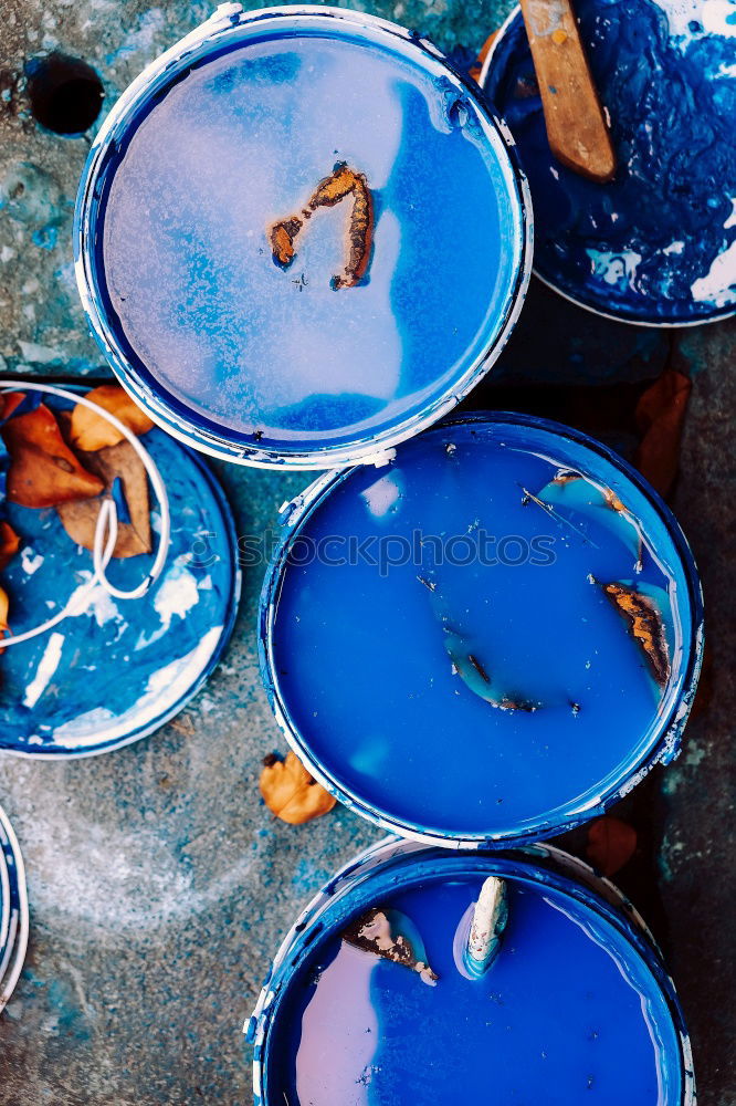 Coffee cups on a blue table