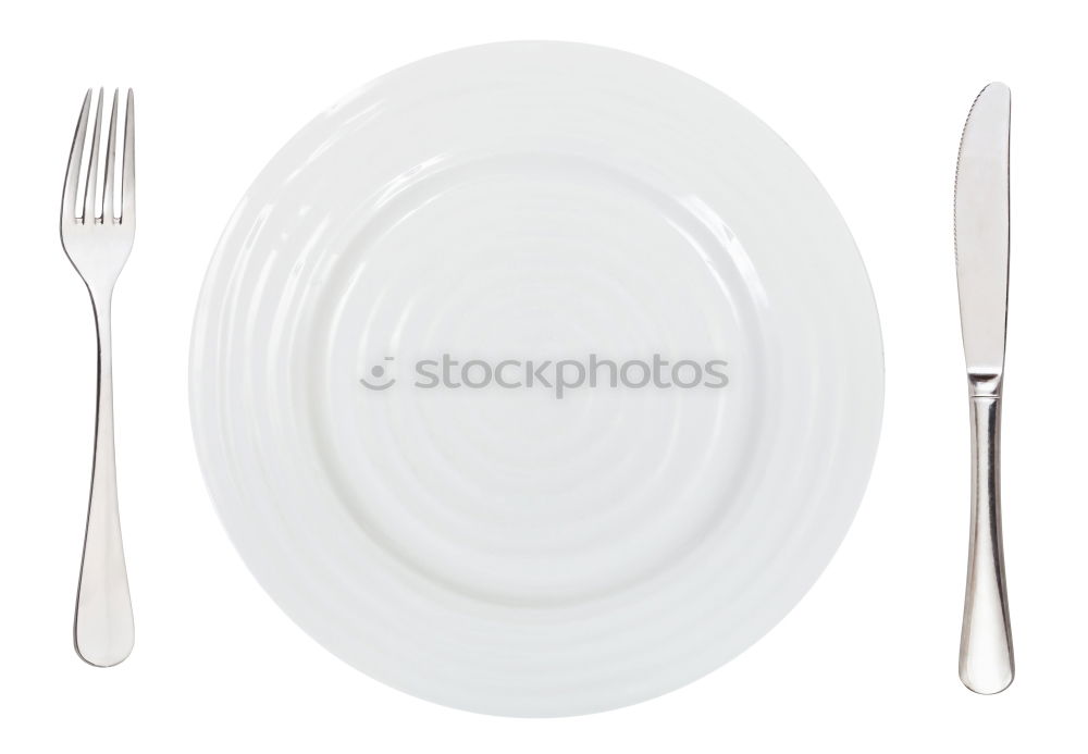 Similar – White dish with iron cutlery