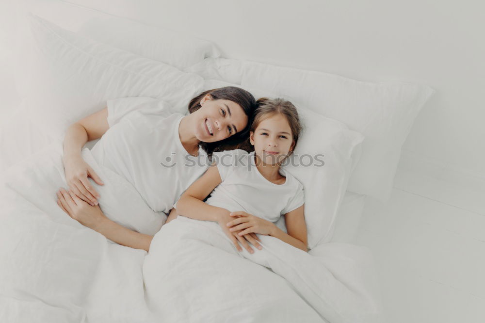 Similar – Image, Stock Photo mother and child son sleeping together