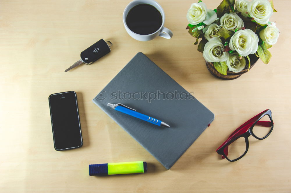 Similar – laptop, notepad, glasses and camera on the wooden desk