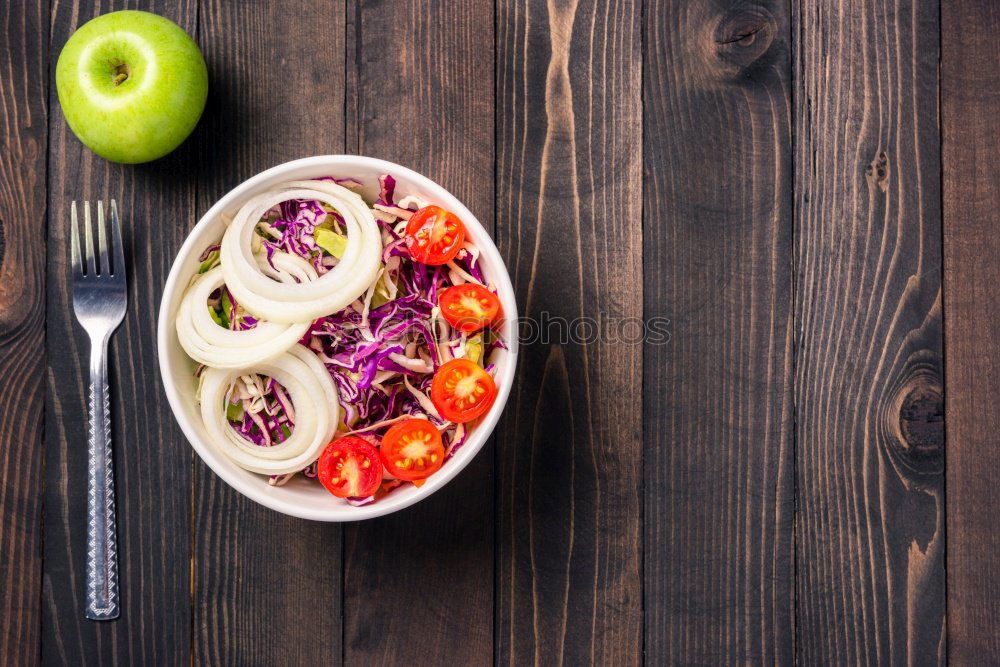 Similar – Vegan Buddha bowl with fresh raw vegetables and quinoa on wood