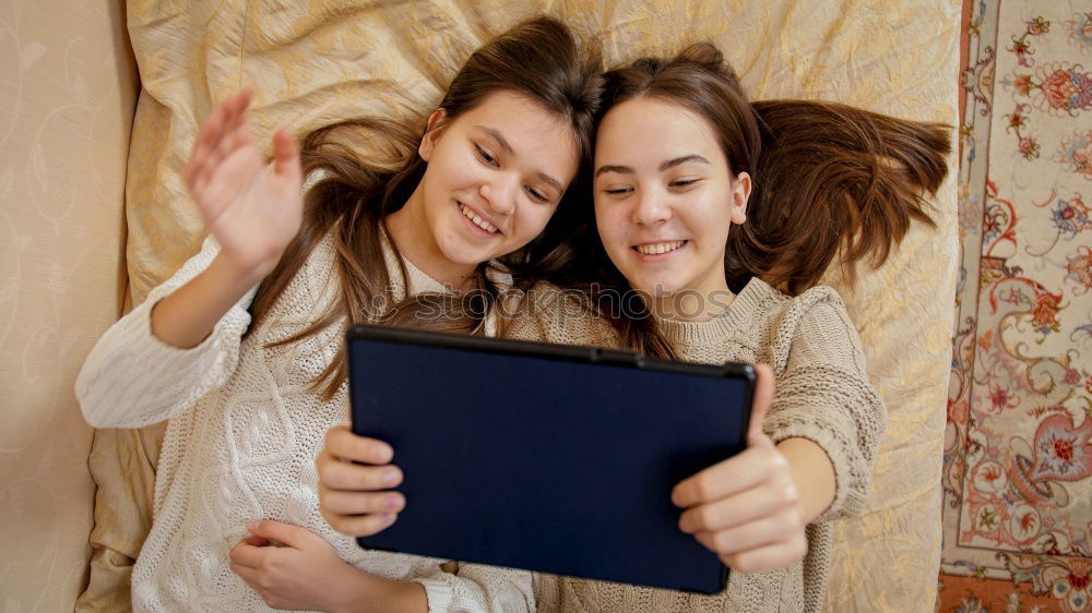 Similar – happy mother and daughter making selfie outdoor