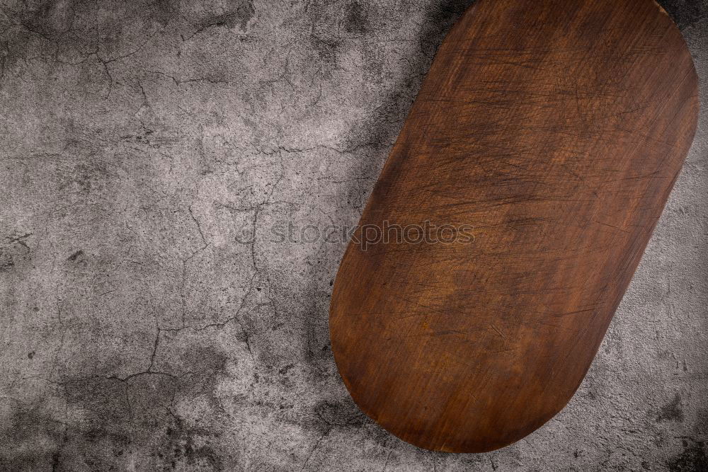 Similar – old brown wooden spoon and cutting board