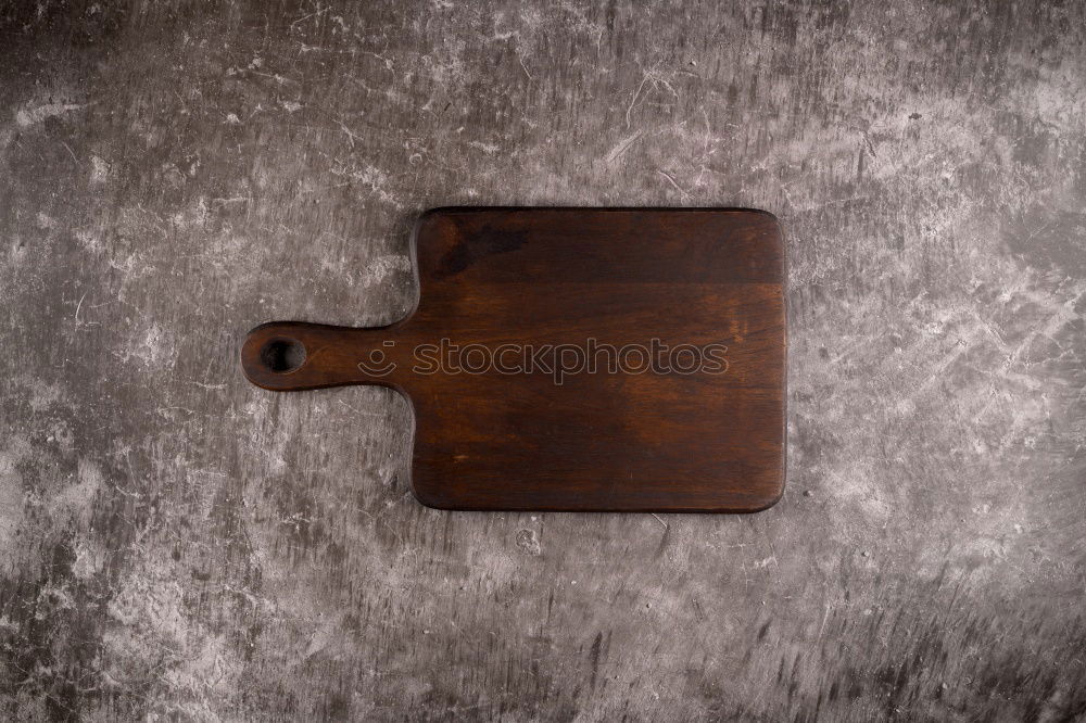 Similar – Wooden table and old cutting board, top view, copy space