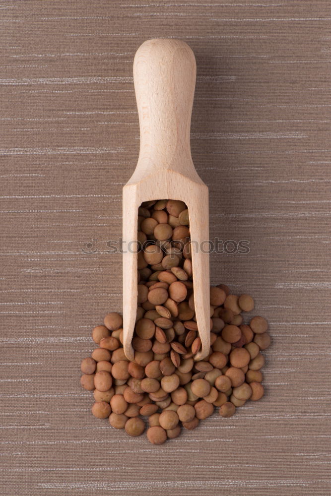 Similar – Soy beans on wooden spoon and wooden table