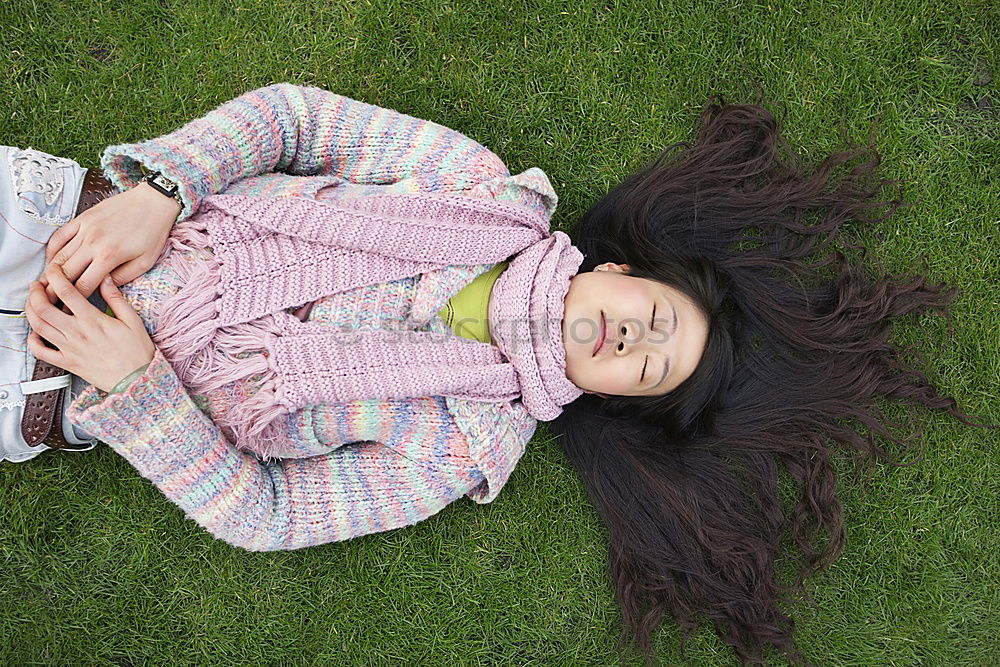 Similar – Young woman hidden behind a plant