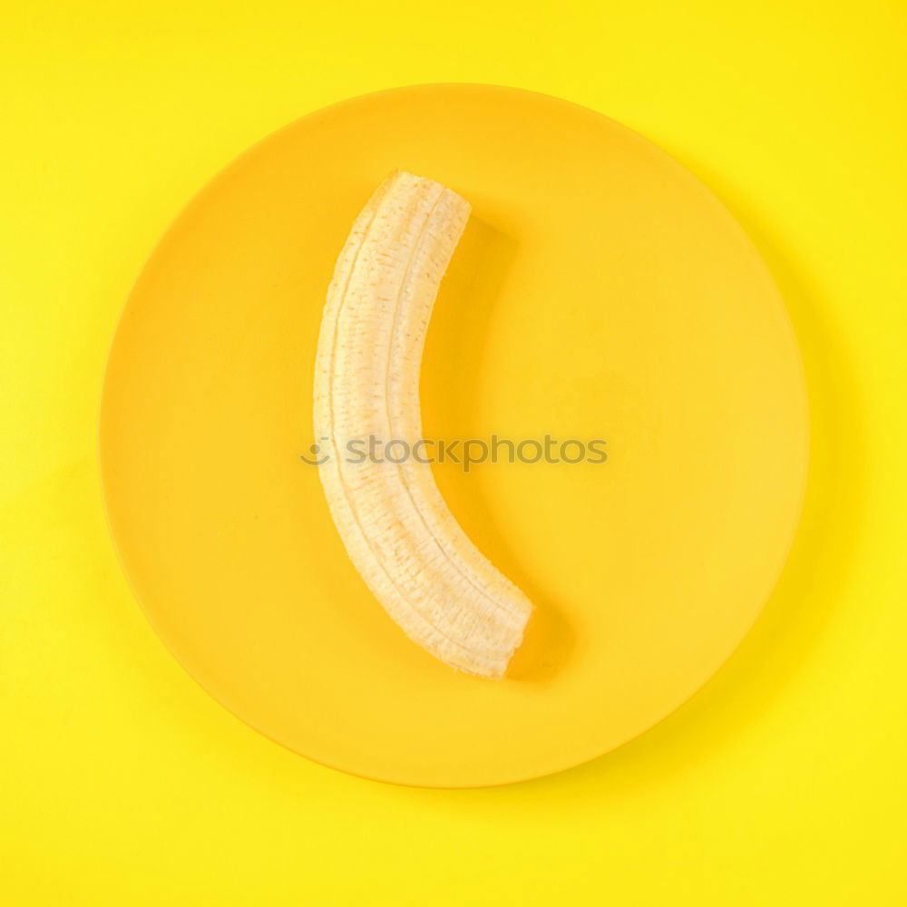 Similar – Jammy banana halves on yellow