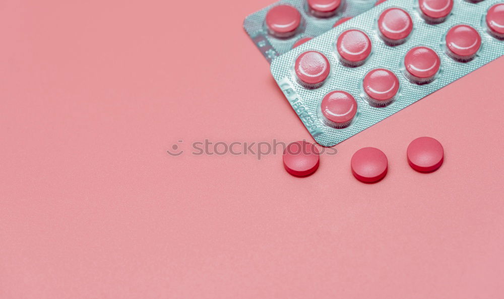 Similar – Pink tablets pill on blur blister pack of tablets pills on pink background. Prescription drugs. Woman health concept. Pharmaceutical industry. Online pharmacy banner. Drugs packaging. Treatment dose.