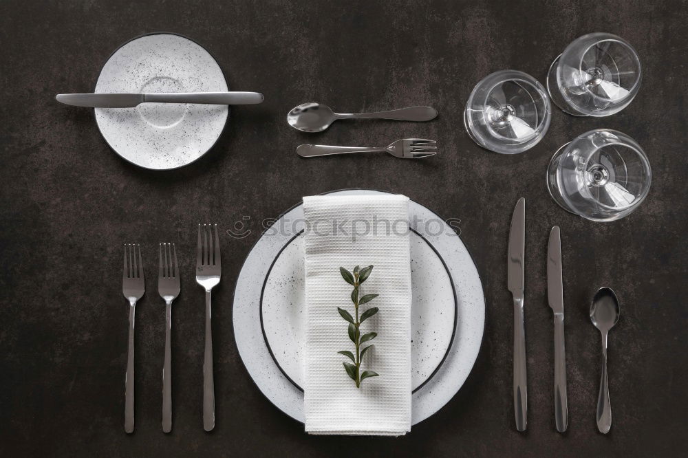 Similar – White plate and metal cutlery