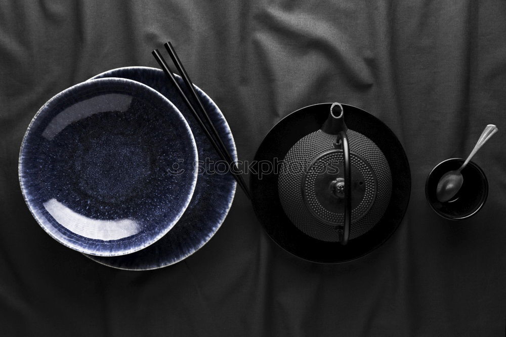 round empty black cast-iron frying pan