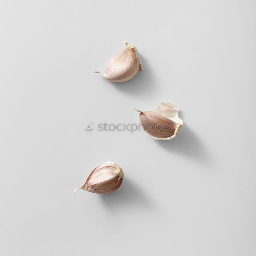 Similar – Image, Stock Photo Fresh garlic on a light pink background