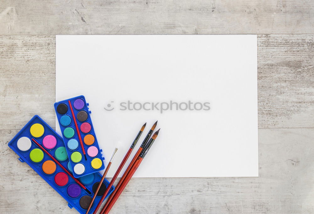 Similar – Garden tools with flower parts on empty notebook .