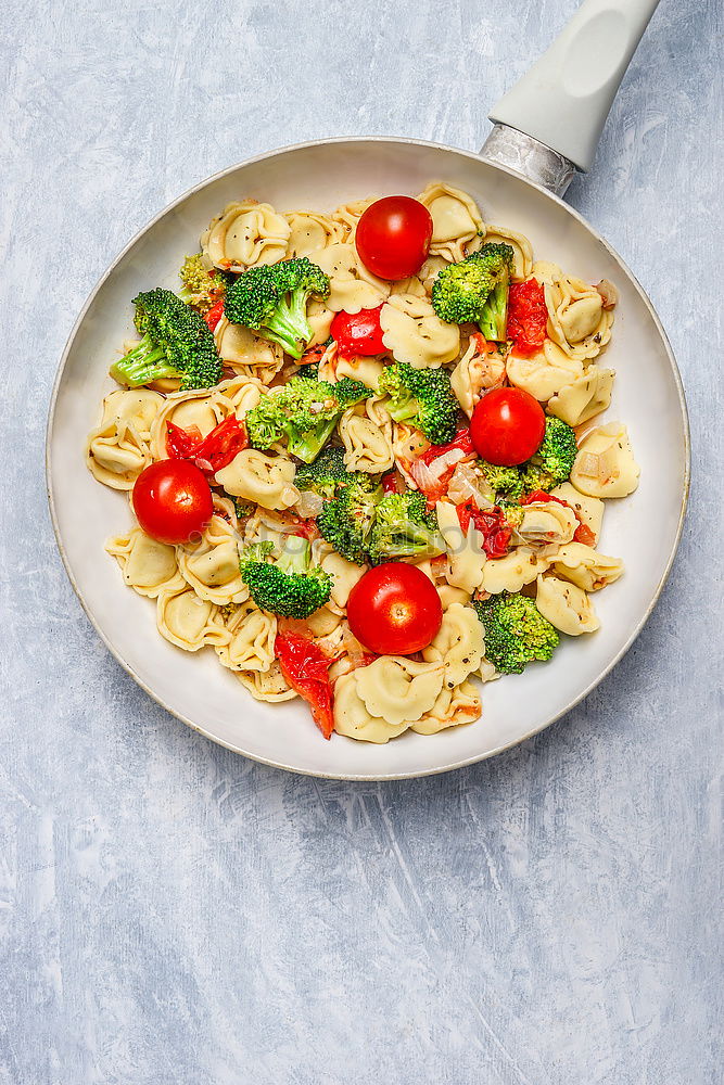 Image, Stock Photo Tortellini with tomatoes and vegetable sauce