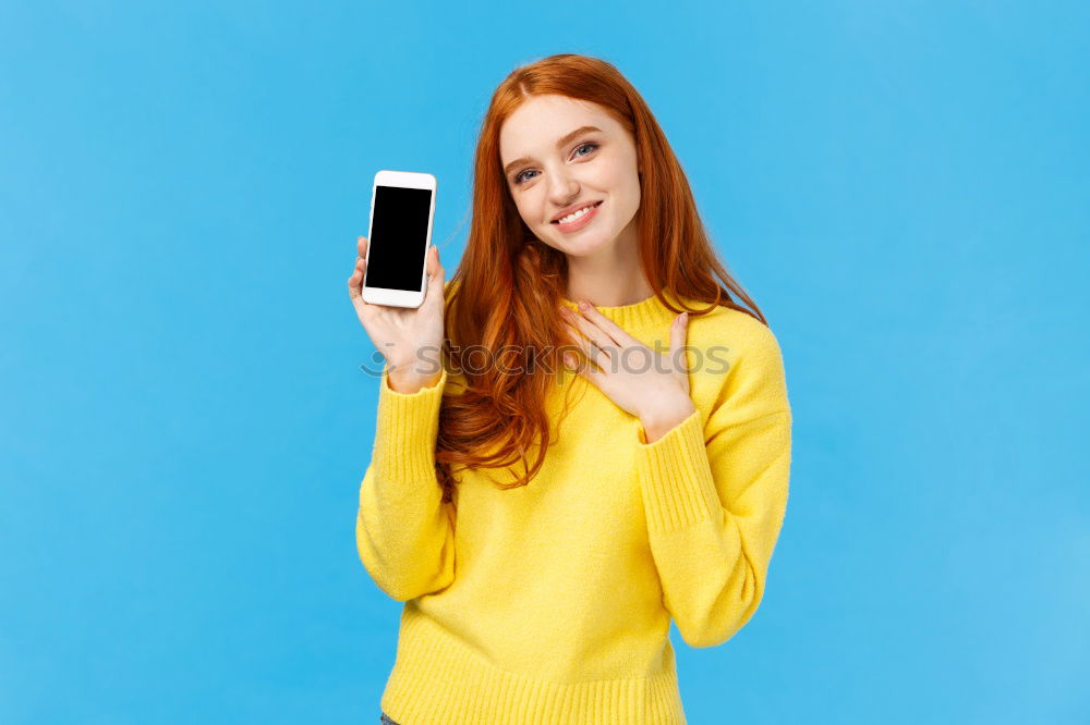 Similar – Cheerful woman in yellow jacket