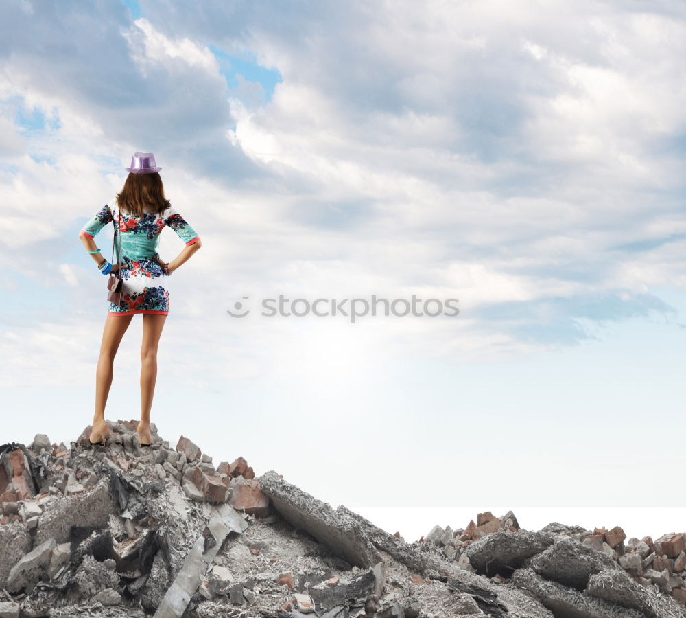 Similar – Low view of a young woman in nature