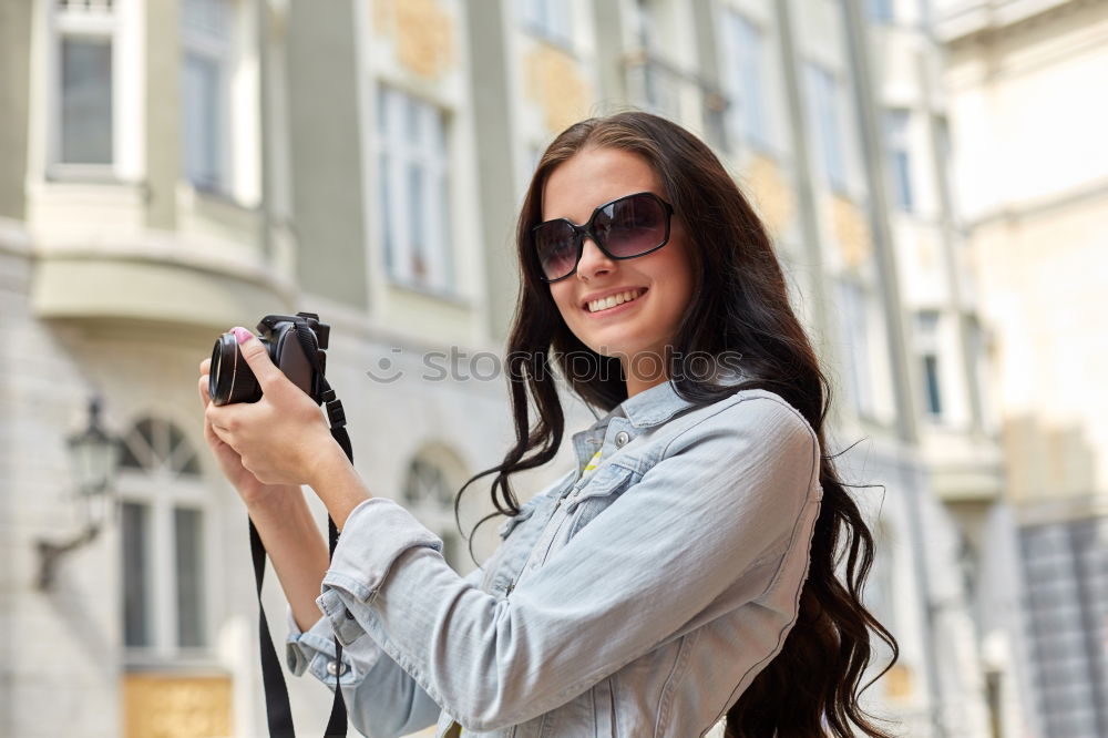 Similar – Stylish Woman Taking Selfie at the City Street