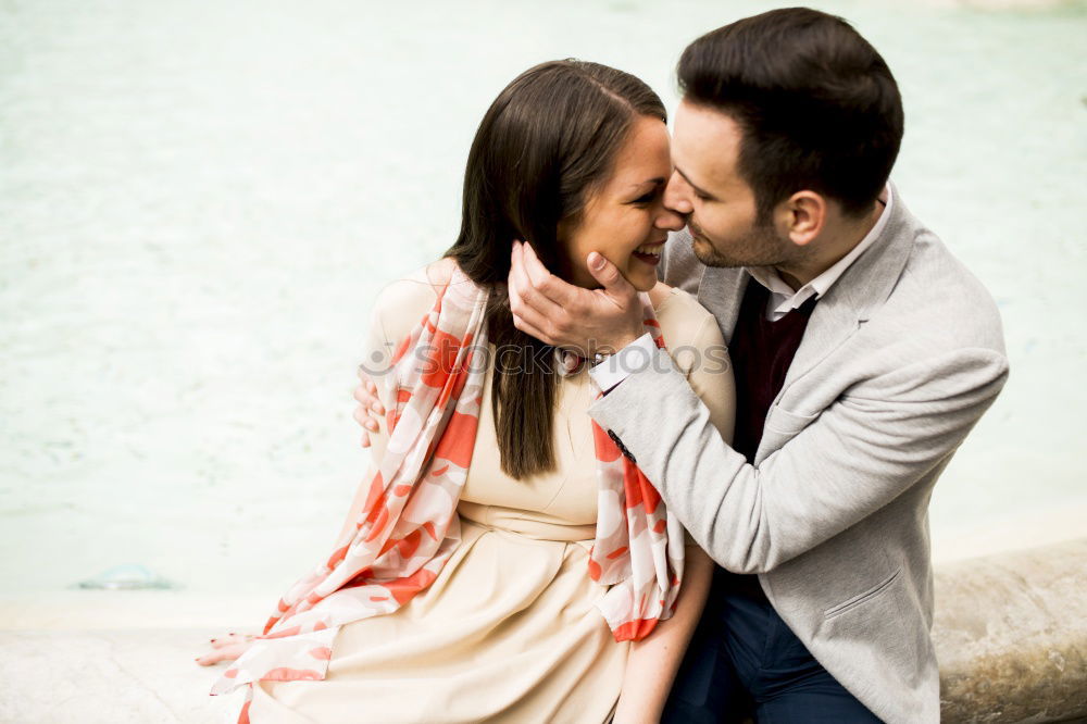 Similar – Happy loving couple. Happy young man piggybacking his girlfriend.