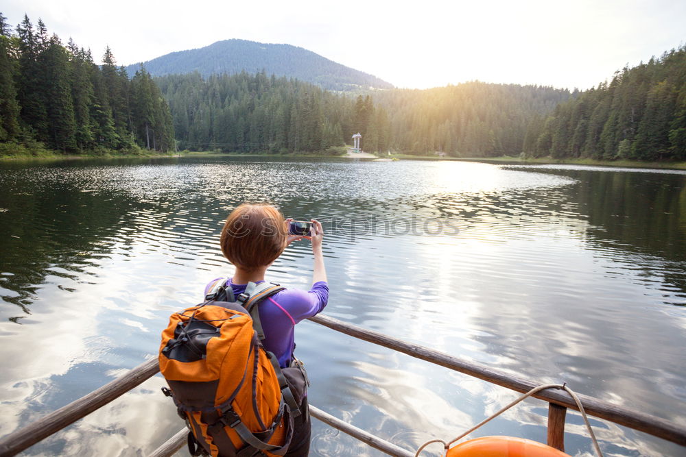 Similar – Unrecognizable woman on kayak exploring river